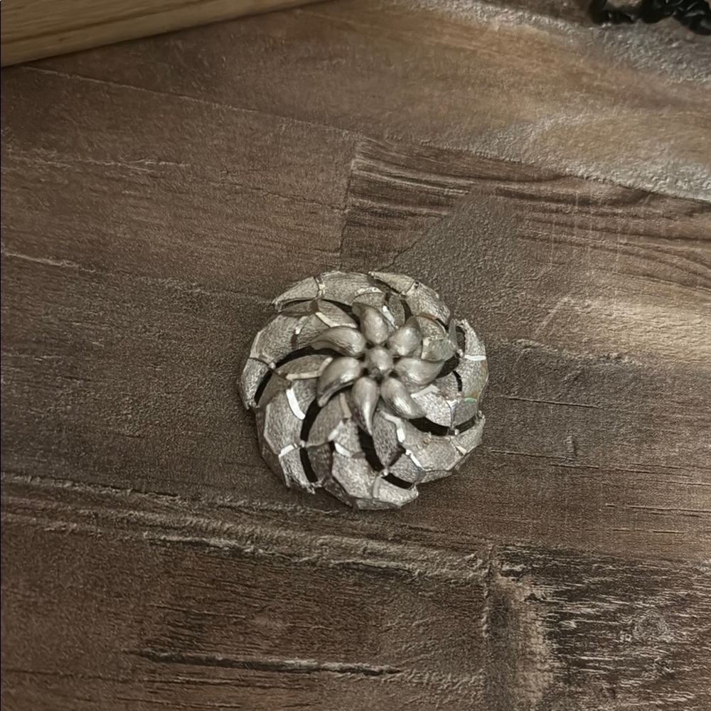 Silver flower brooch